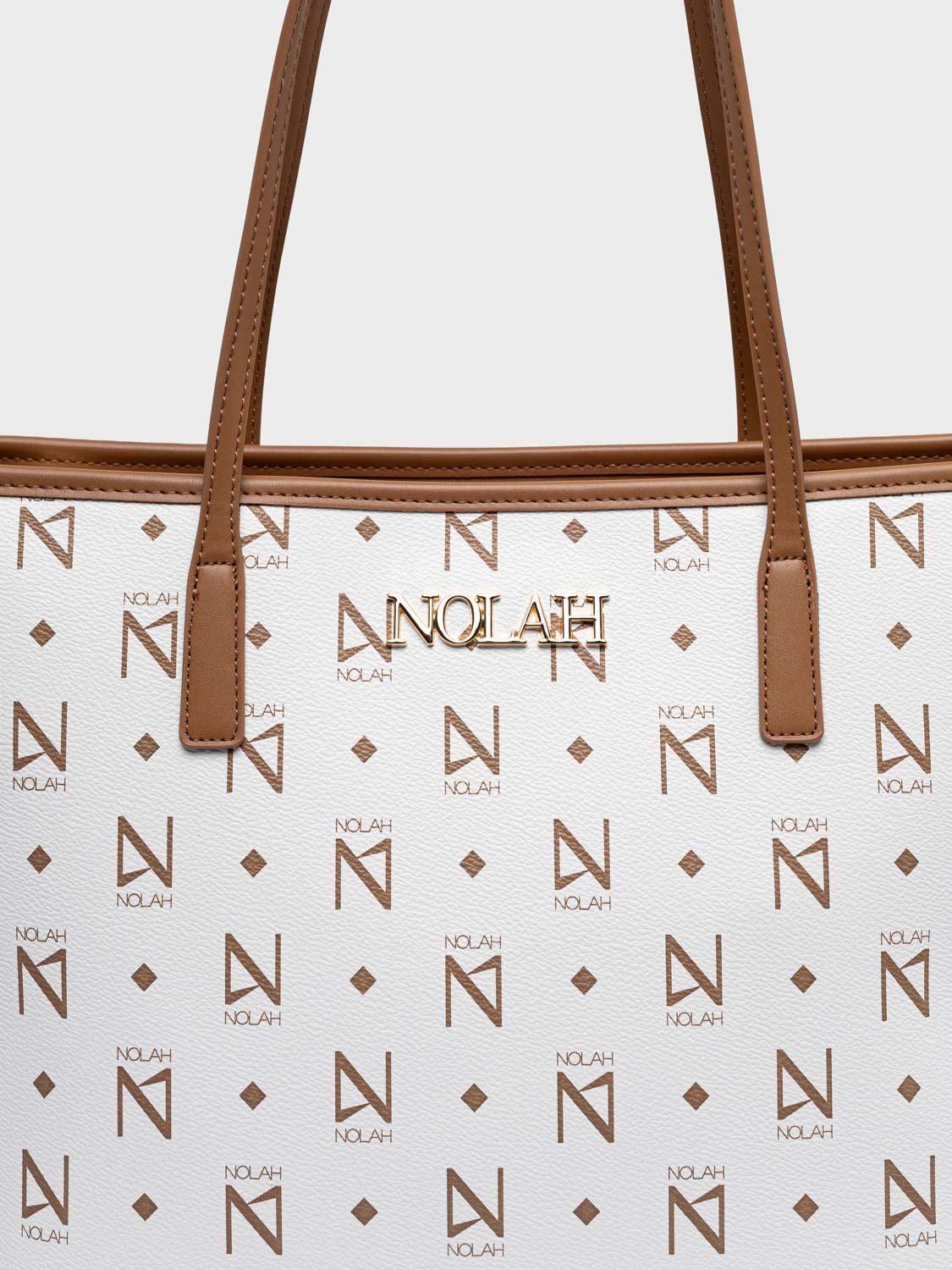 Ansa White – Brown